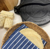 Tortillas de maíz con tortilladora de hierro fundido